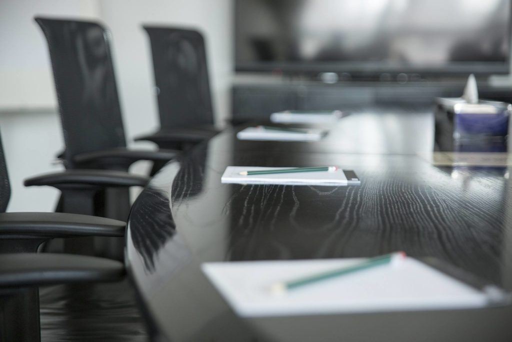 board room with empty chairs