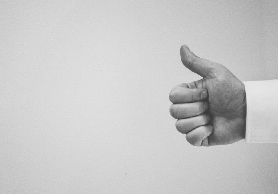 thumbs up in black and white
