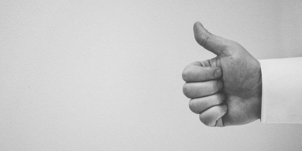 thumbs up in black and white