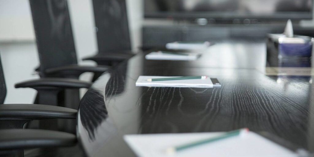 board room with empty chairs