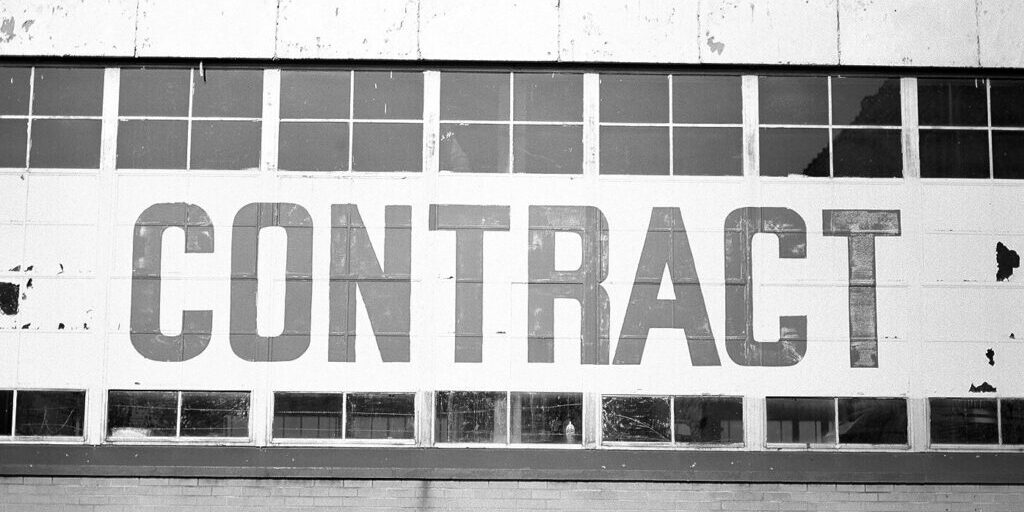 Contract-Word-on-side-of-building