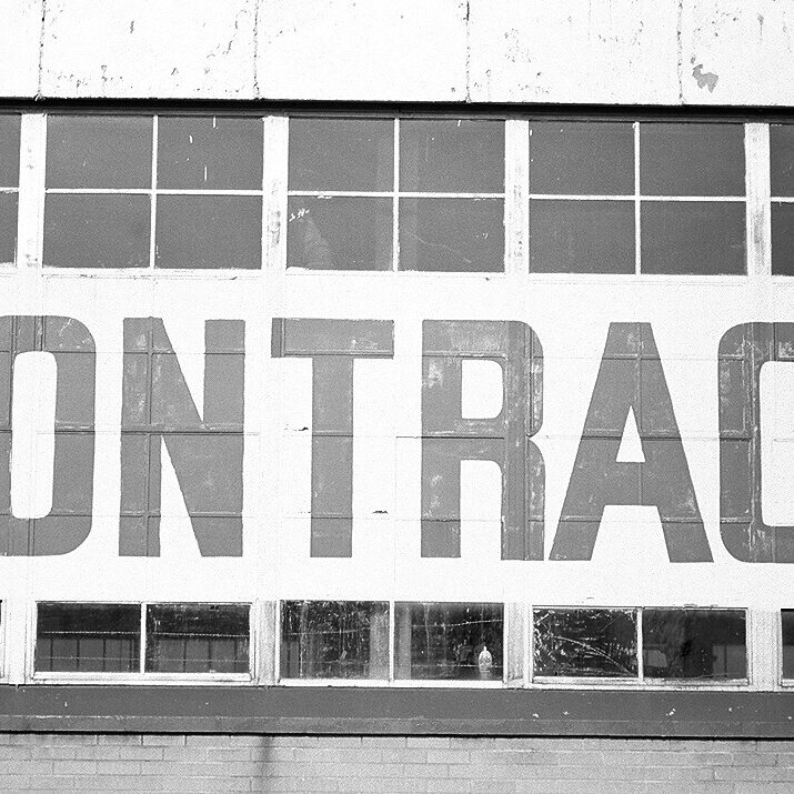 Contract-Word-on-side-of-building