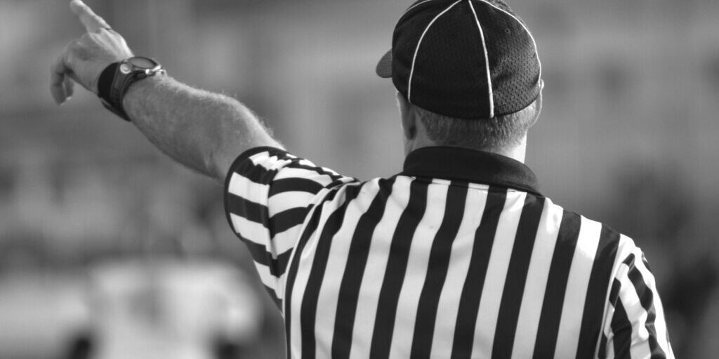 Nonprofit-Articles+Bylaws-BW_Referee-calling-a-play