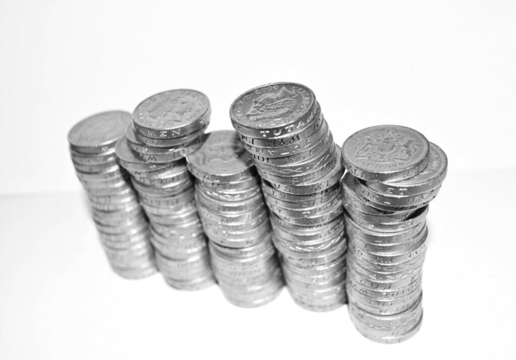 Nonprofit-Corporate-Sponsorship_BW_gold-coins-stacked