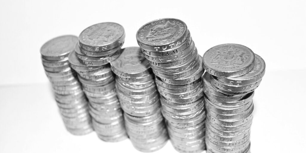 Nonprofit-Corporate-Sponsorship_BW_gold-coins-stacked