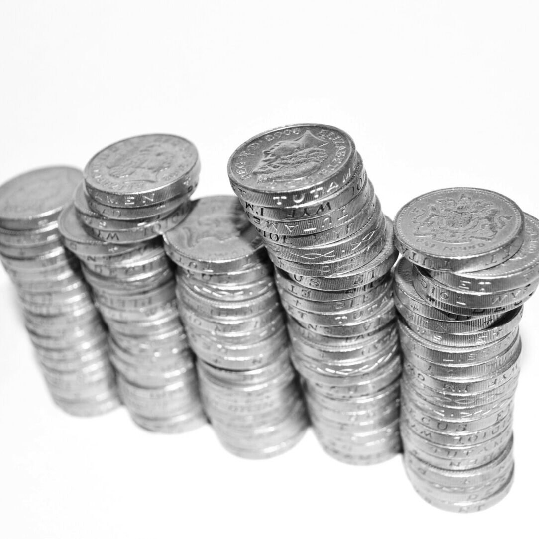 Nonprofit-Corporate-Sponsorship_BW_gold-coins-stacked