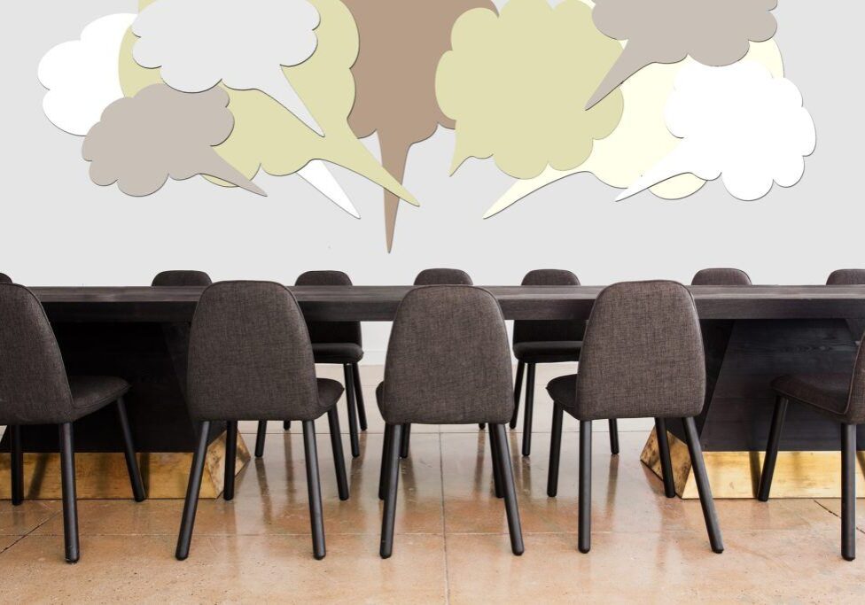 table with chairs around