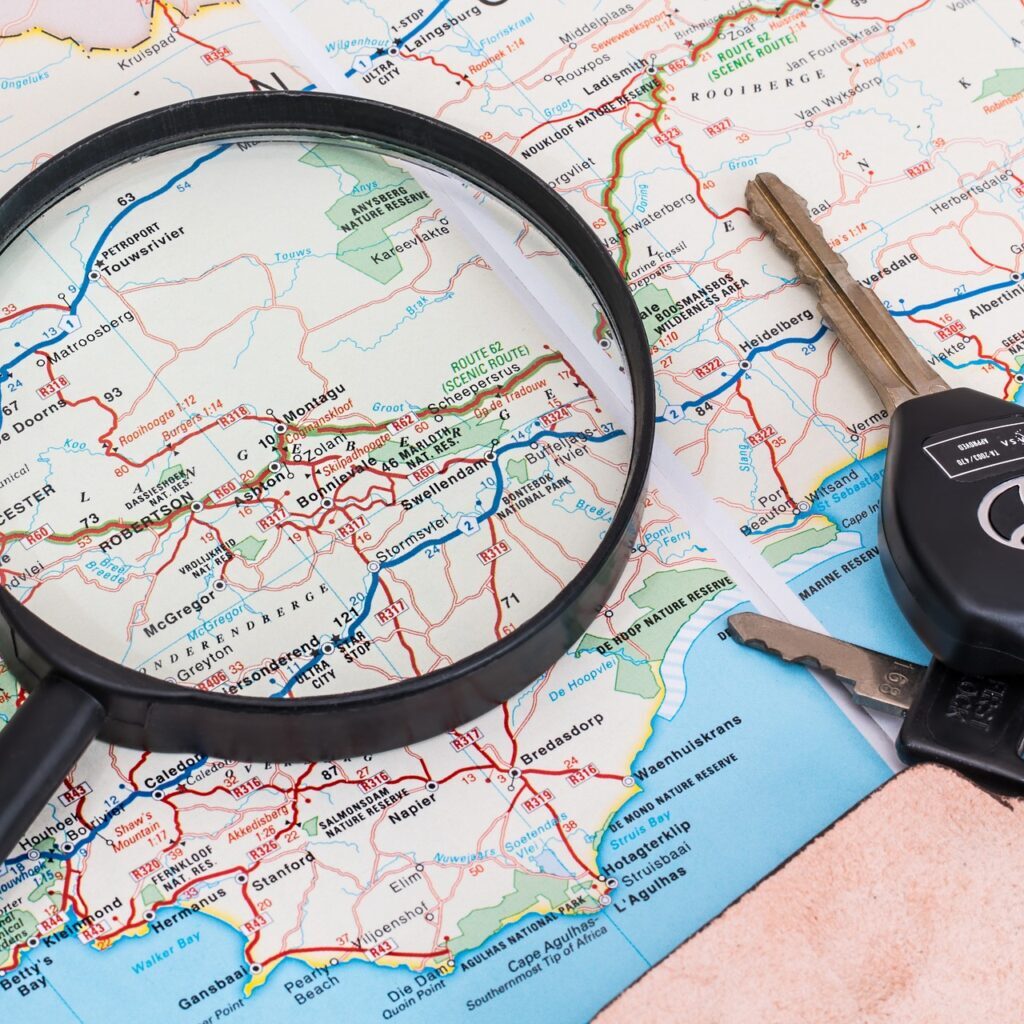 map-with-magnifying-glass-and-keys