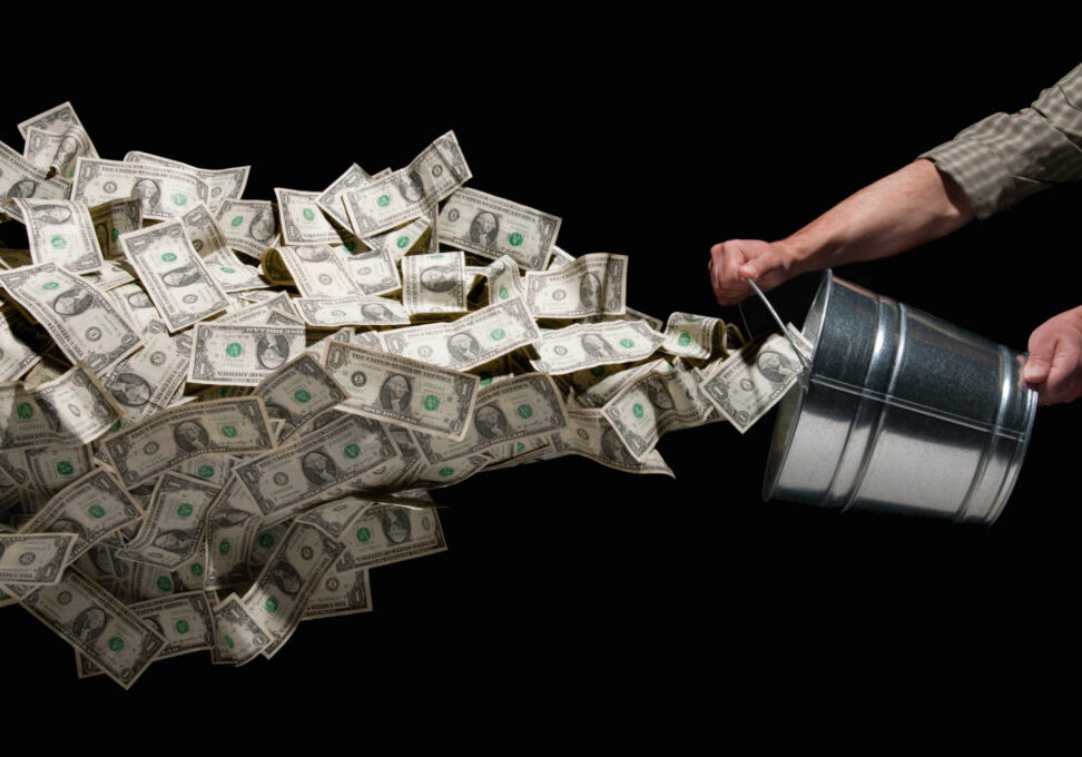 Throwing bucket of money