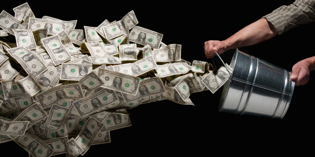 Throwing bucket of money