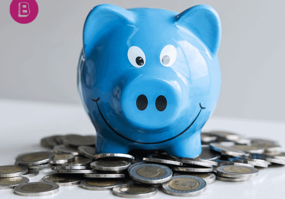 piggy bank with money around it